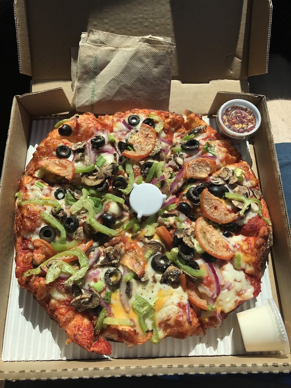 Close-up of a pizza menu section.