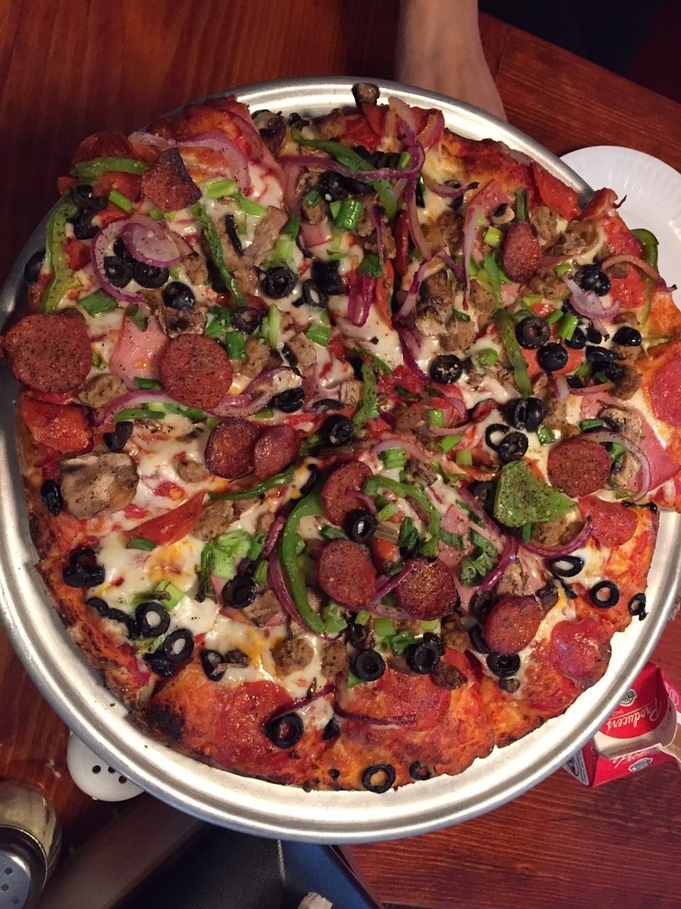 Close-up of a pizza menu section.