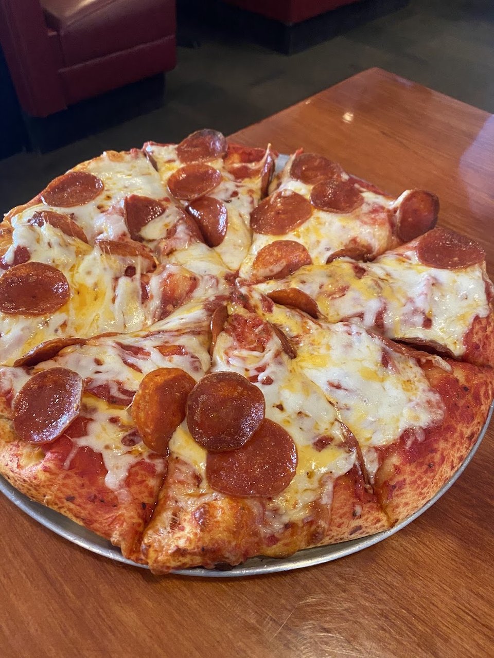 Close-up of a pizza menu section.